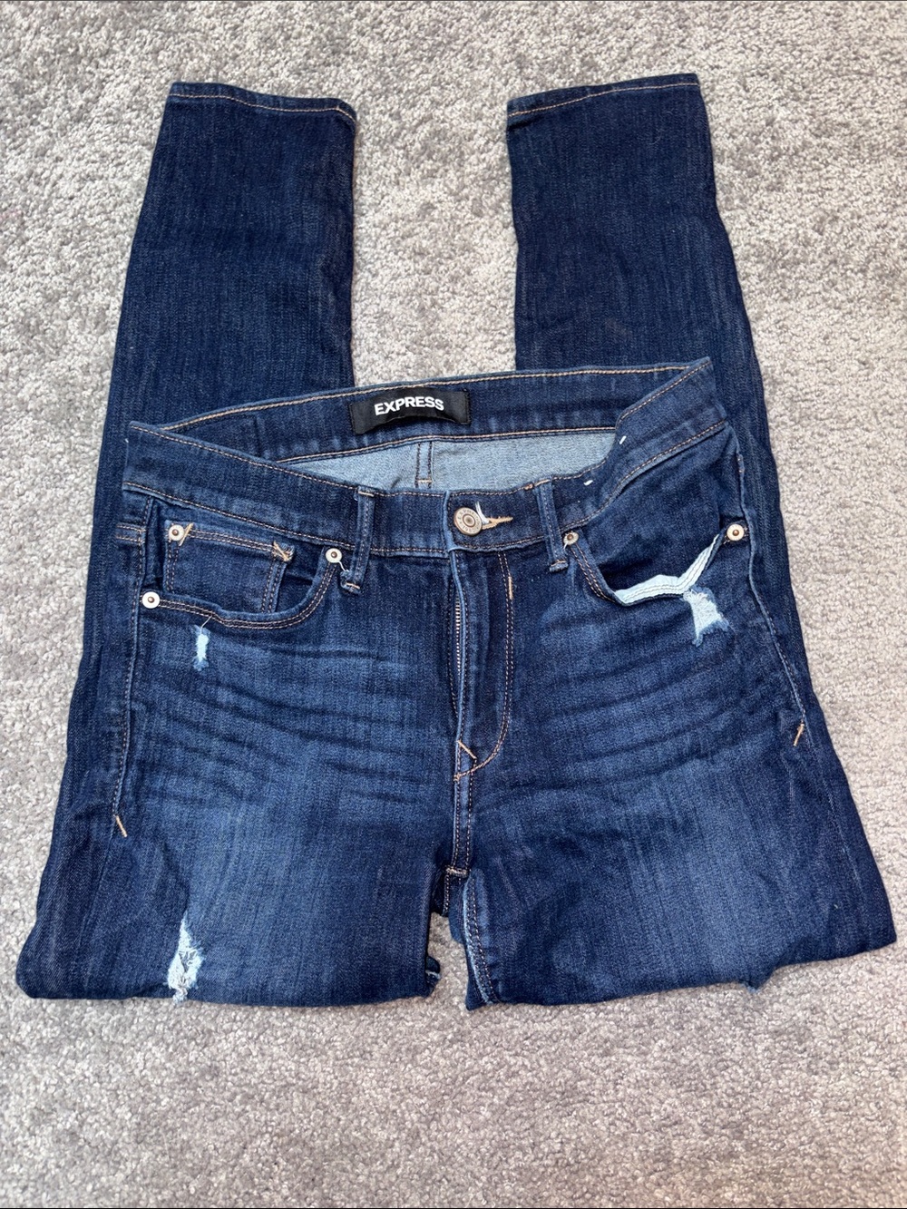 Express Dark Indigo Stretch Mid Rise Legging Jeans with Subtle Distressing